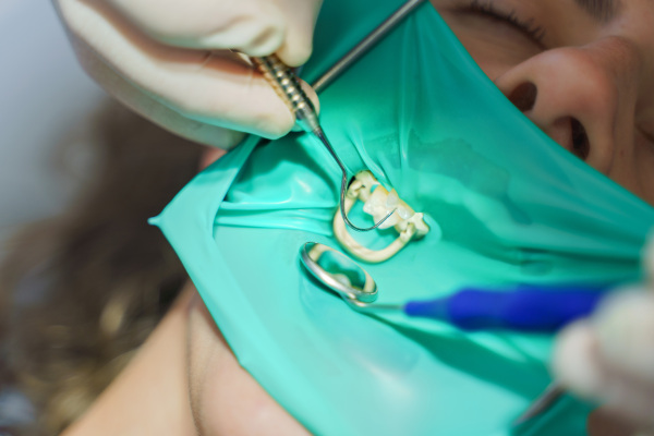 Close-up of young woman at dental examination in an ambulance.