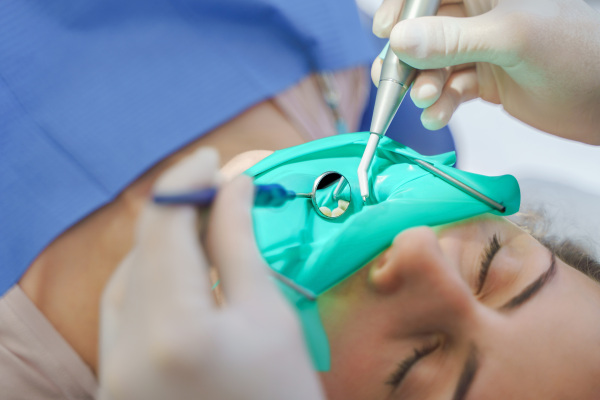 Close-up of dental examination in an ambulance.