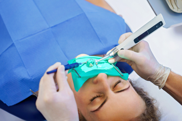 Close-up of young woman at dental examination in an ambulance.