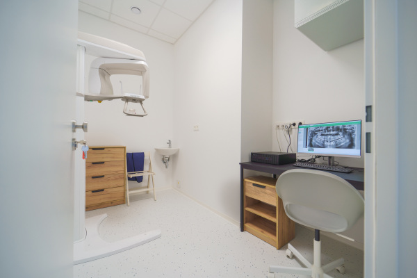 Photo of a modern dentist ambulance, x-ray room, no people.