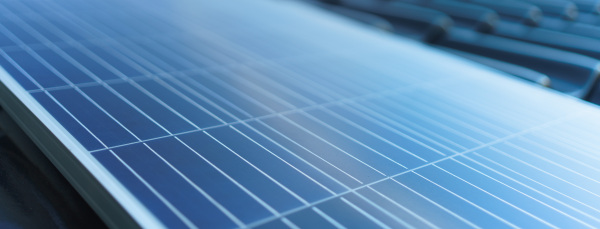 Close-up of solar panel installed on a roof.