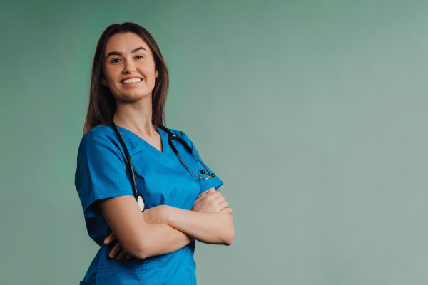 Portrait of young nurse with a stethoscope, studio shoot.