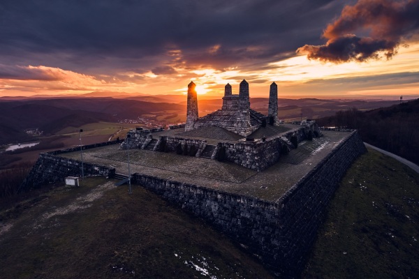 Aerial view of stone monument, memorial on hill during sunset. The Barrow of Milan Rastislav Stefanik in Slovakia.