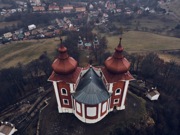 Aerial view of historical church atop on the hill. Late baroque calvary in Banska Stiavnica in Slovakia.