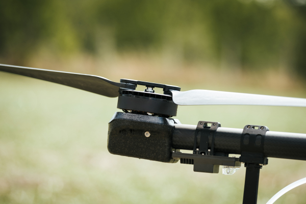 Close up of propeller on black drone. Drone rotor or propeller.