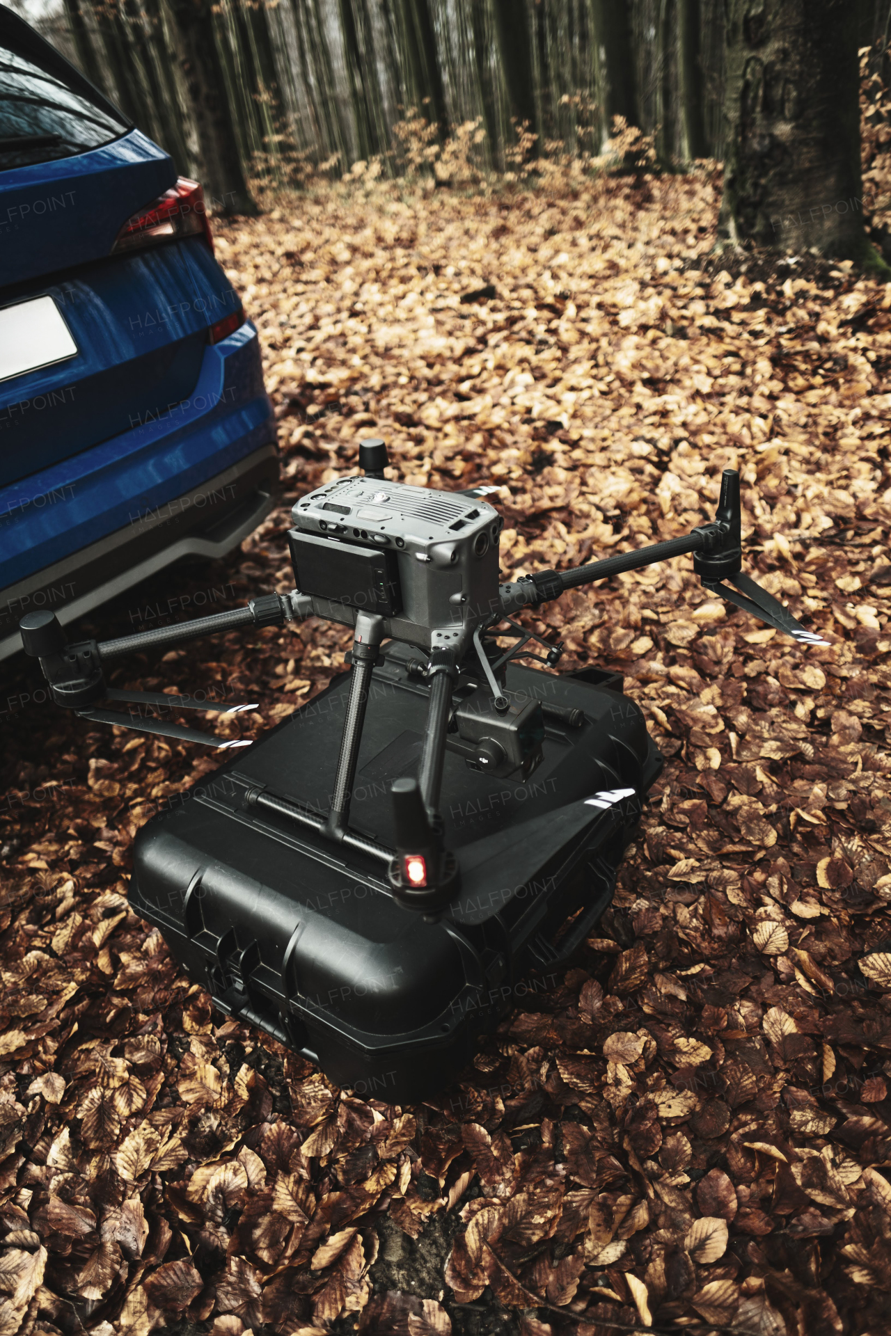 Aerial view of a drone moderning over forest, monitoring and analyzing in the forestry management. Dron mapping forest after natural disaster assessing damage.