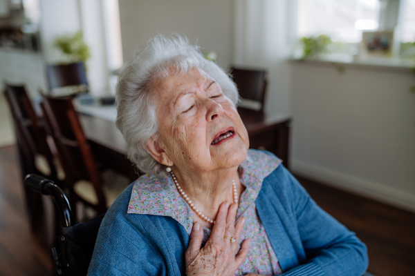 Portrait of the senior woman feeling sick.