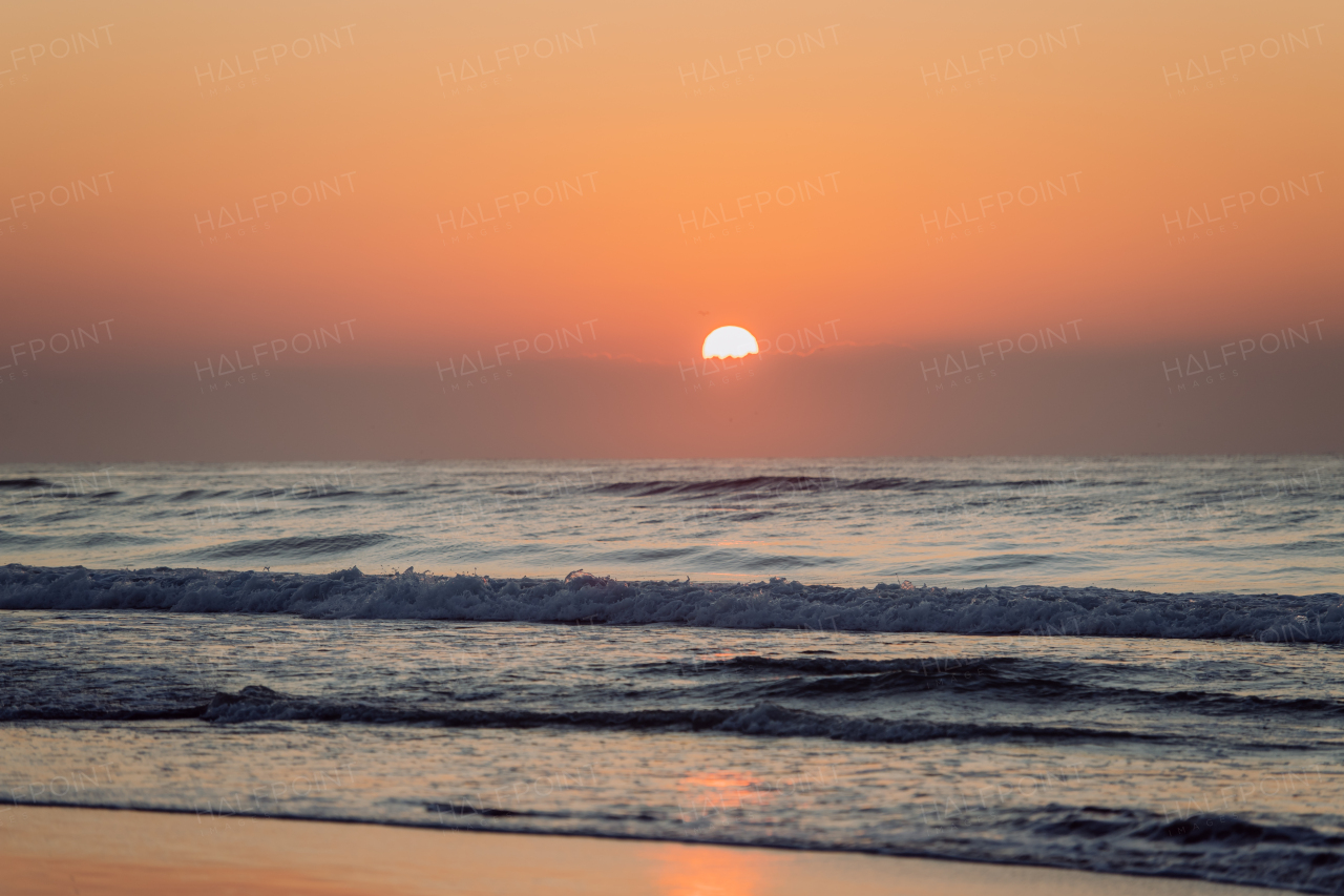 Landscape with sea sunset on a beach.