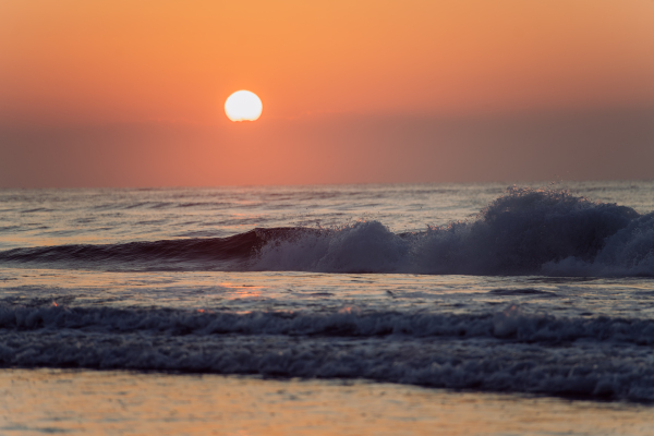 Landscape with sea sunset on a beach.