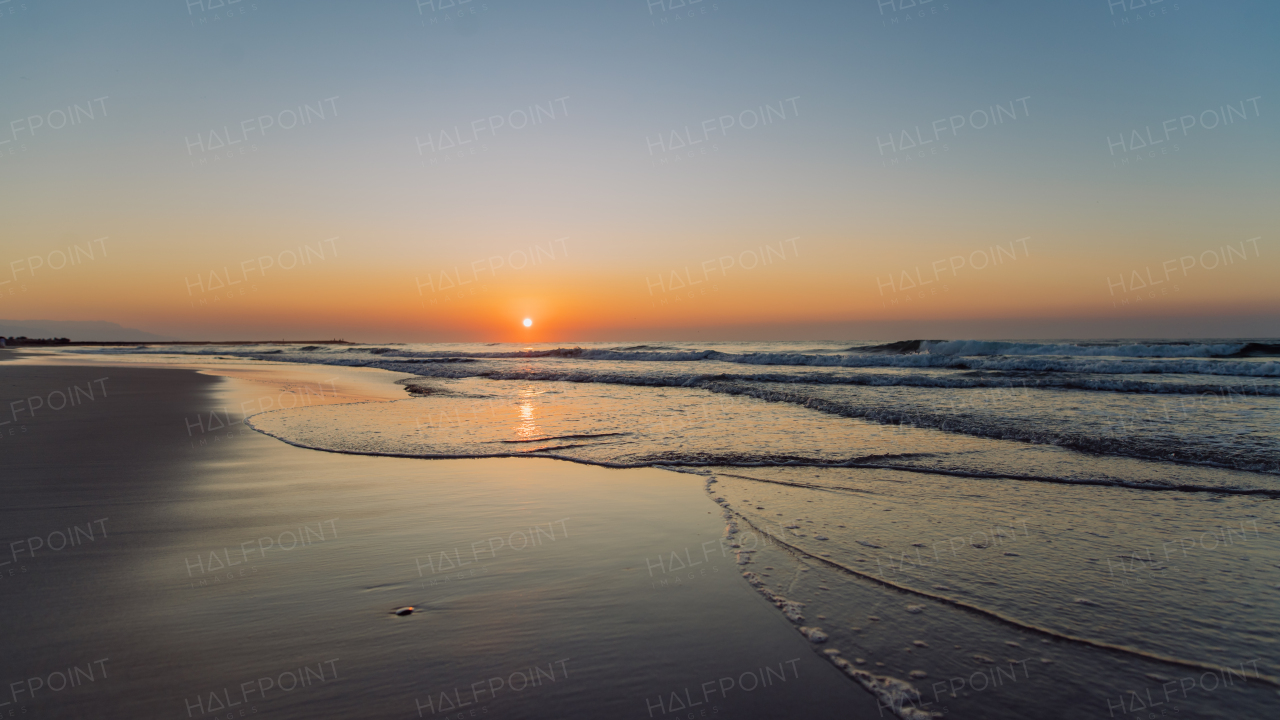 Landscape with sea sunset on a beach.