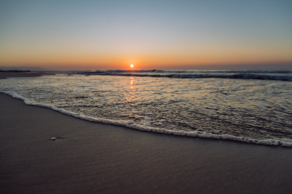 Landscape with sea sunset on a beach.