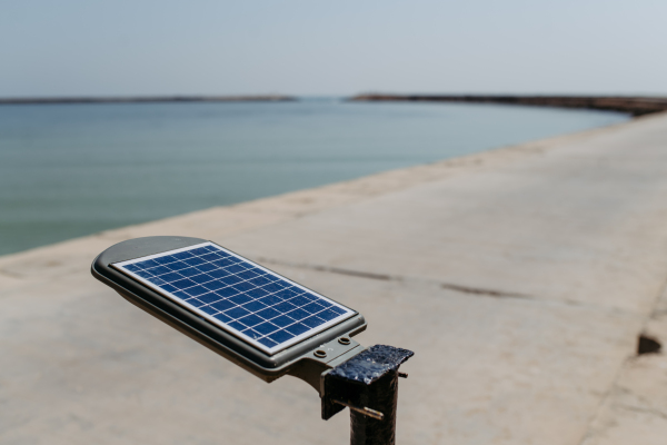 Close-up of street solar lighting near the beach.