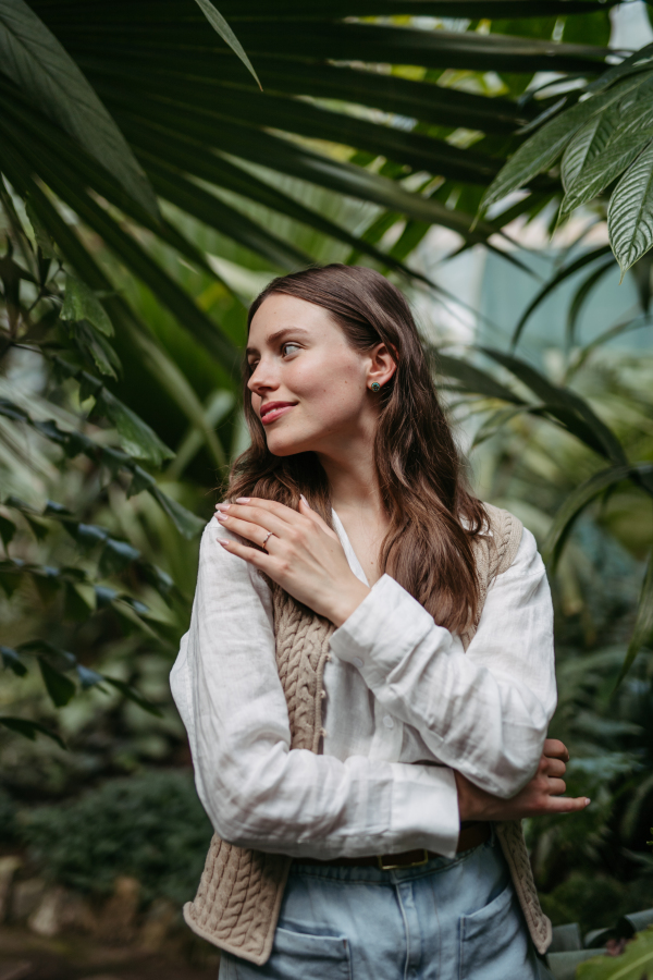 Portrait of a young woman in jungle.