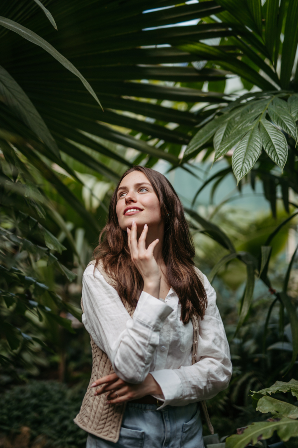 Portrait of a young woman in jungle.