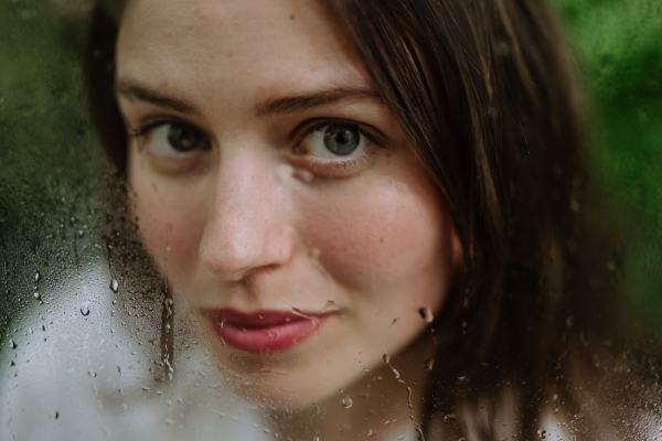 Portrait of a young woman in jungle.