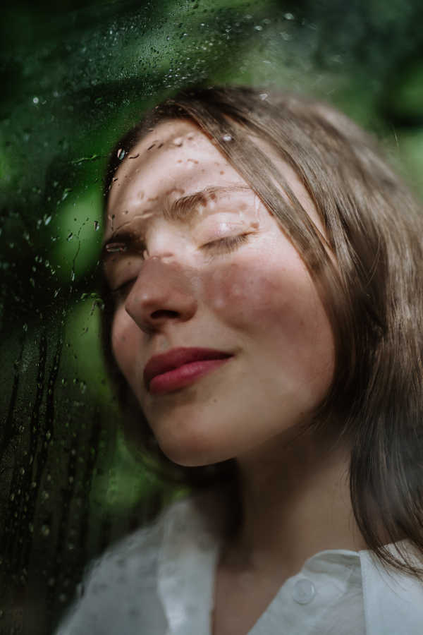 Portrait of a young woman in jungle.