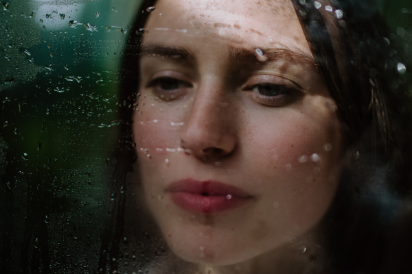 Portrait of a young woman in jungle.