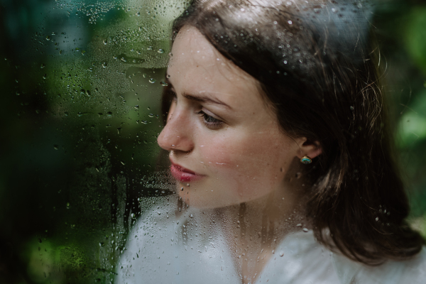 Portrait of a young woman in jungle.