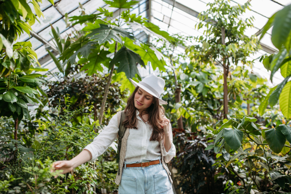 Portrait of a young woman in jungle.