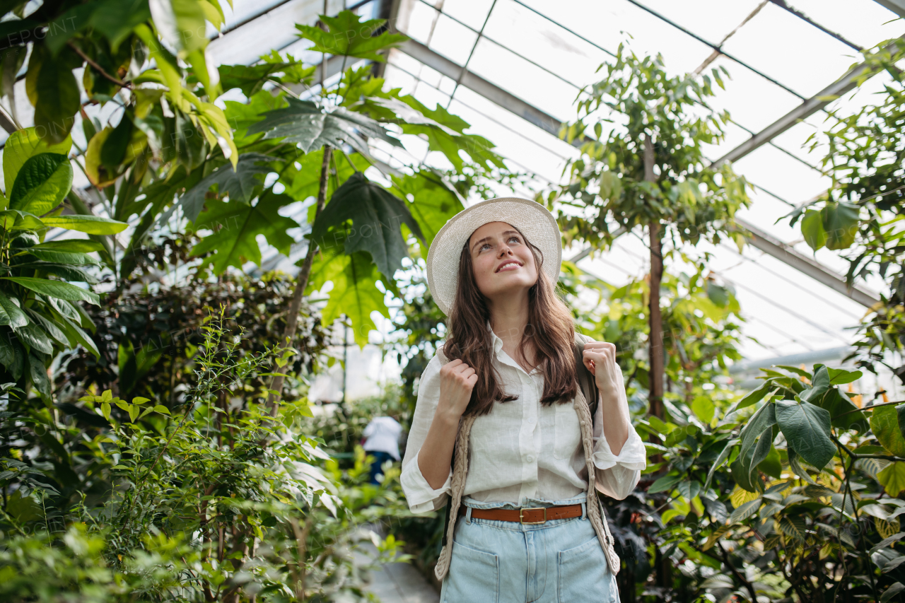 Portrait of a young woman in jungle.