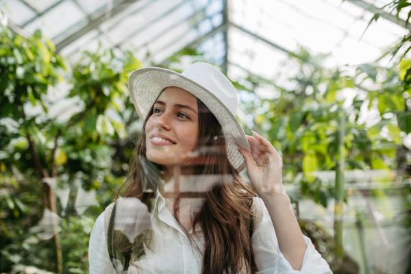 Portrait of a young woman in jungle.