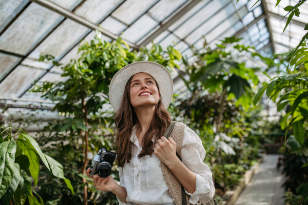 Portrait of a young woman in jungle.