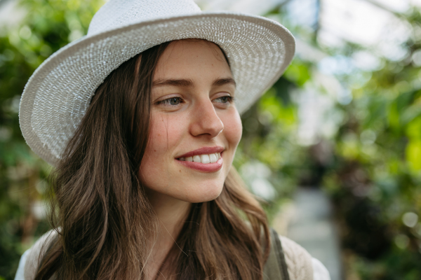 Portrait of a young woman in jungle.