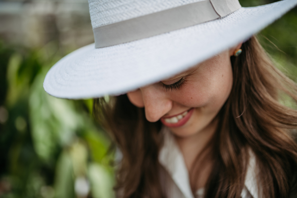 Portrait of a young woman in jungle.