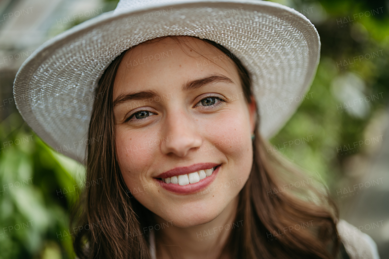 Portrait of a young woman in jungle.