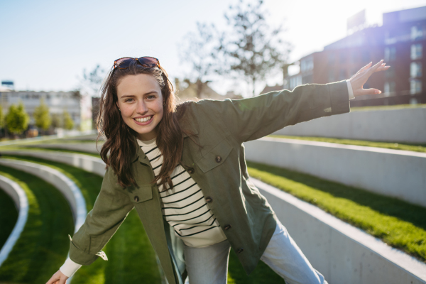 Young woman spending her free time in a city park.