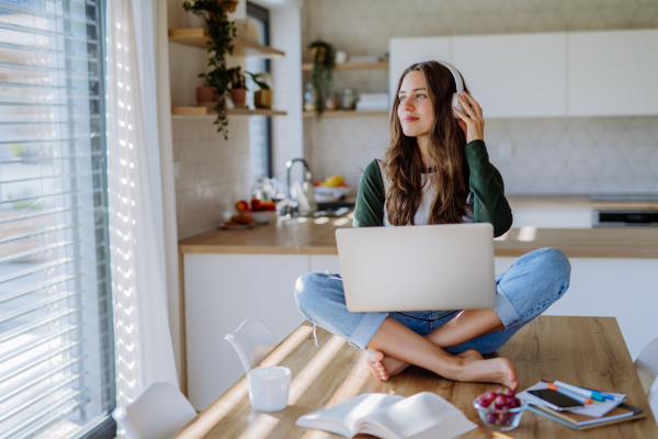 Young woman having homeoffice in an apartment.