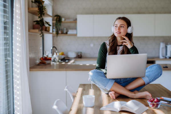 Young woman having homeoffice in an apartment.