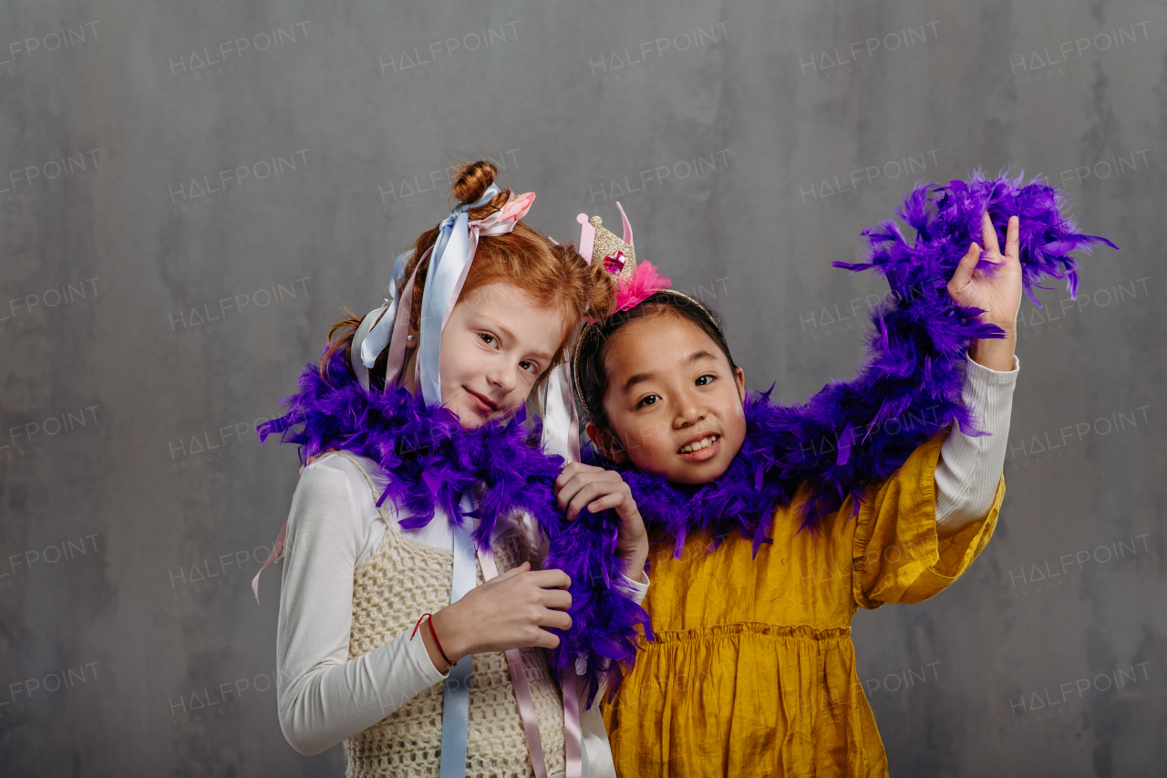 Portrait of two children in funny costumes.