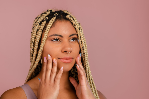 Portrait of a happy multiracial woman, studio shoot.