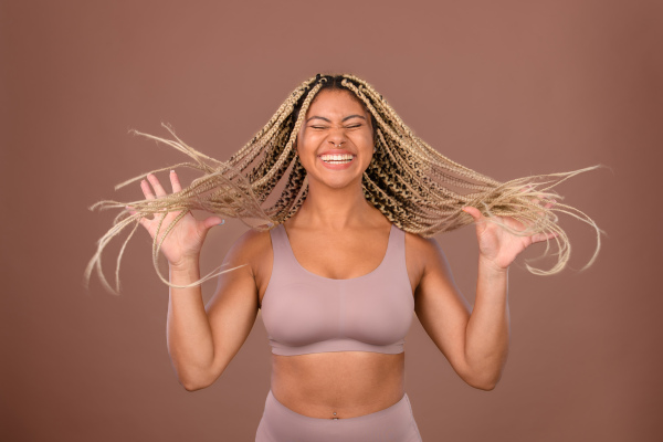 Portrait of a happy multiracial woman, studio shoot.