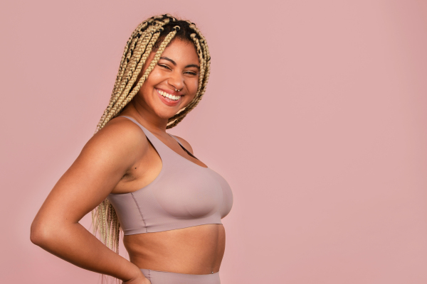 Portrait of a happy multiracial woman, studio shoot.