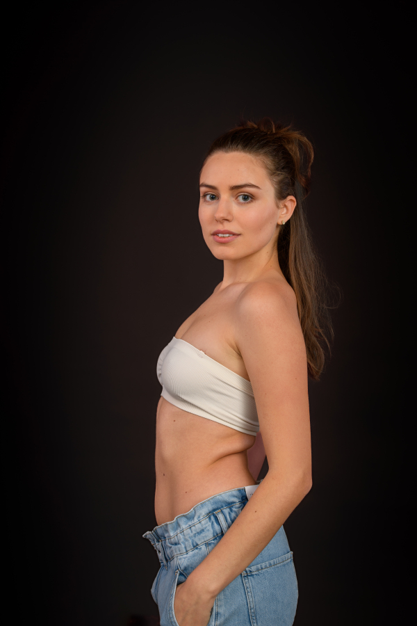 Portrait of a happy young woman, studio shoot.