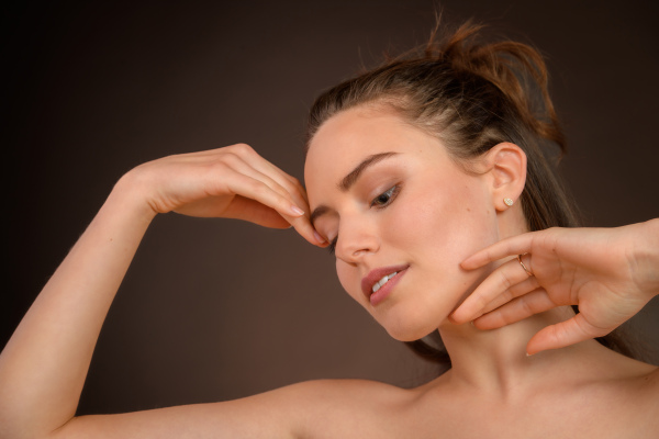 Portrait of a happy young woman, studio shoot.