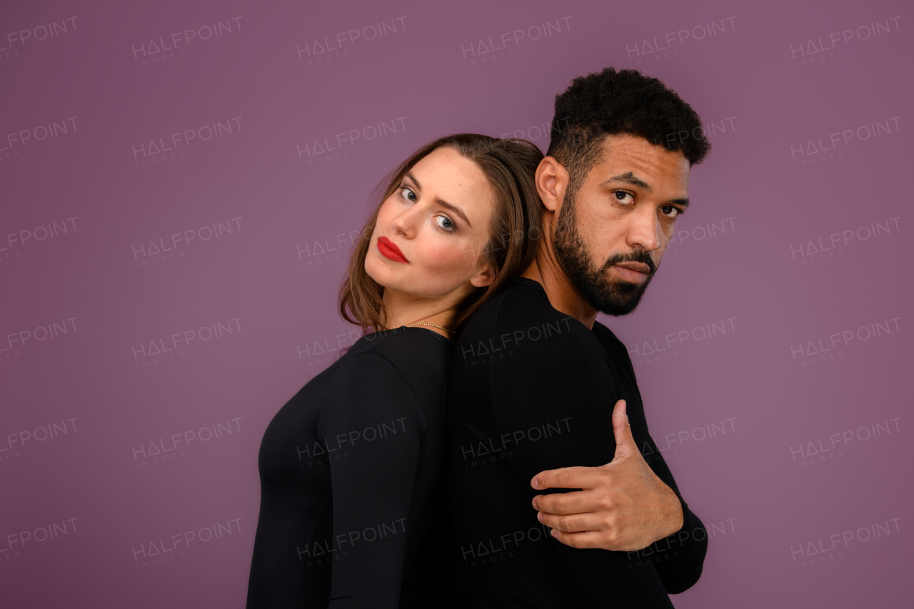 Portrait of a young multiracial couple, studio shoot.