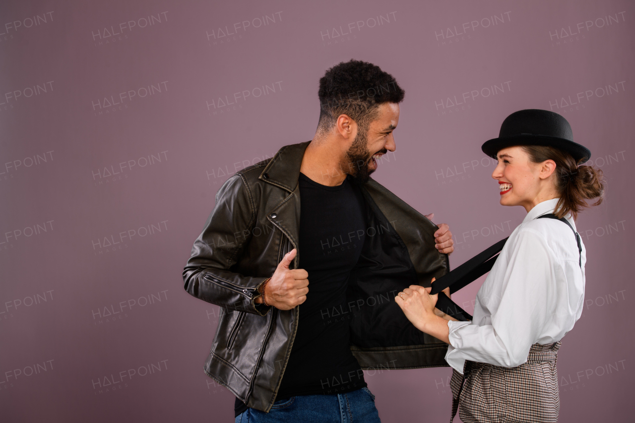 Portrait of a young multiracial couple, studio shoot.