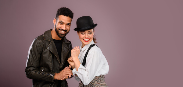 Portrait of a young multiracial couple, studio shoot.