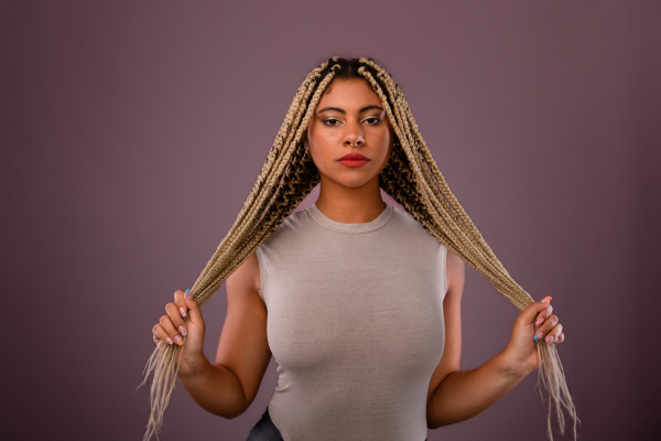 Portrait of a happy multiracial woman, studio shoot.