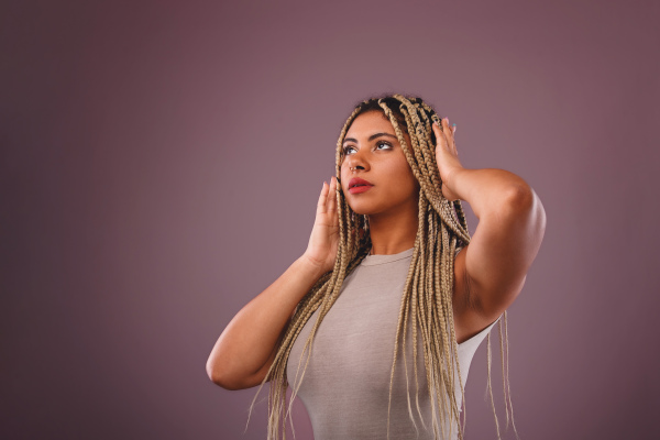 Portrait of a happy multiracial woman, studio shoot.