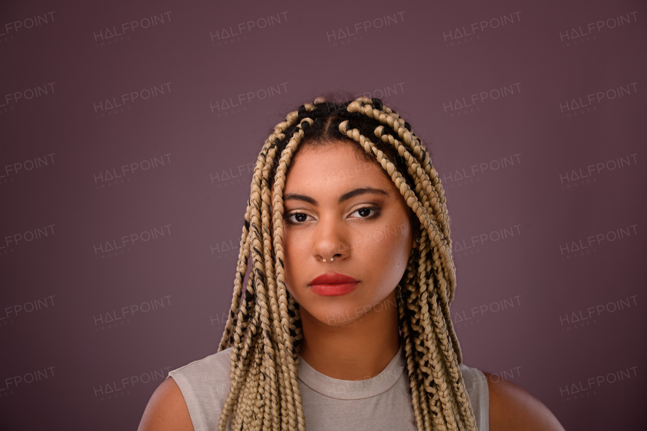 Portrait of a happy multiracial woman, studio shoot.