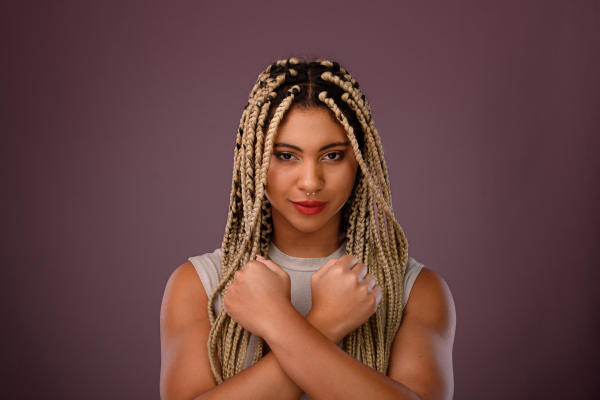 Portrait of a happy multiracial woman, studio shoot.