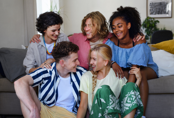 A portrait of diverse group of friends with mixed races having fun together indoors, Friendship and lifestyle concepts