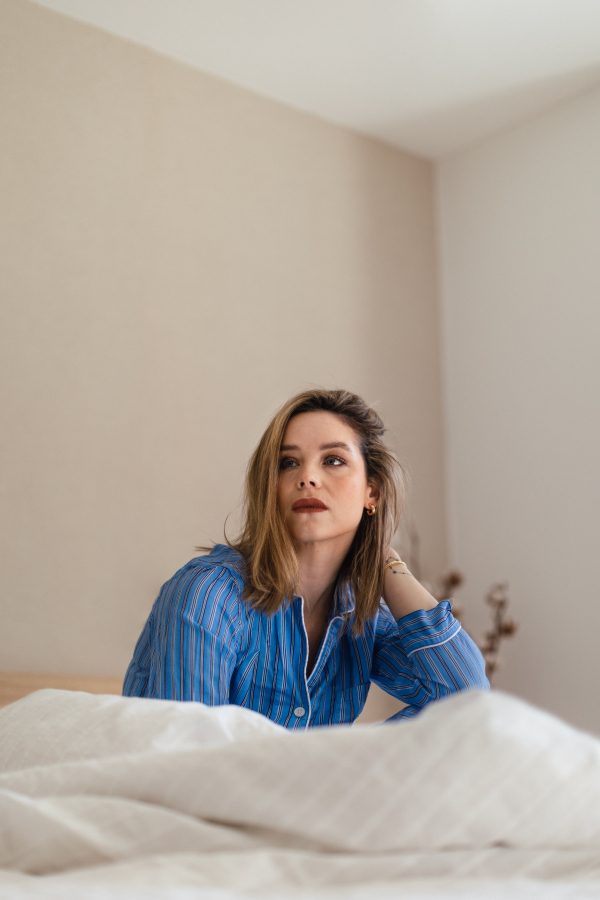 Portrait of young woman in a pajama.