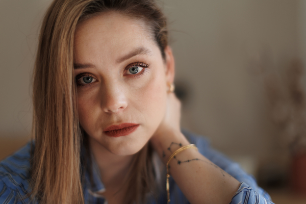 Portrait of young woman in a pajama.