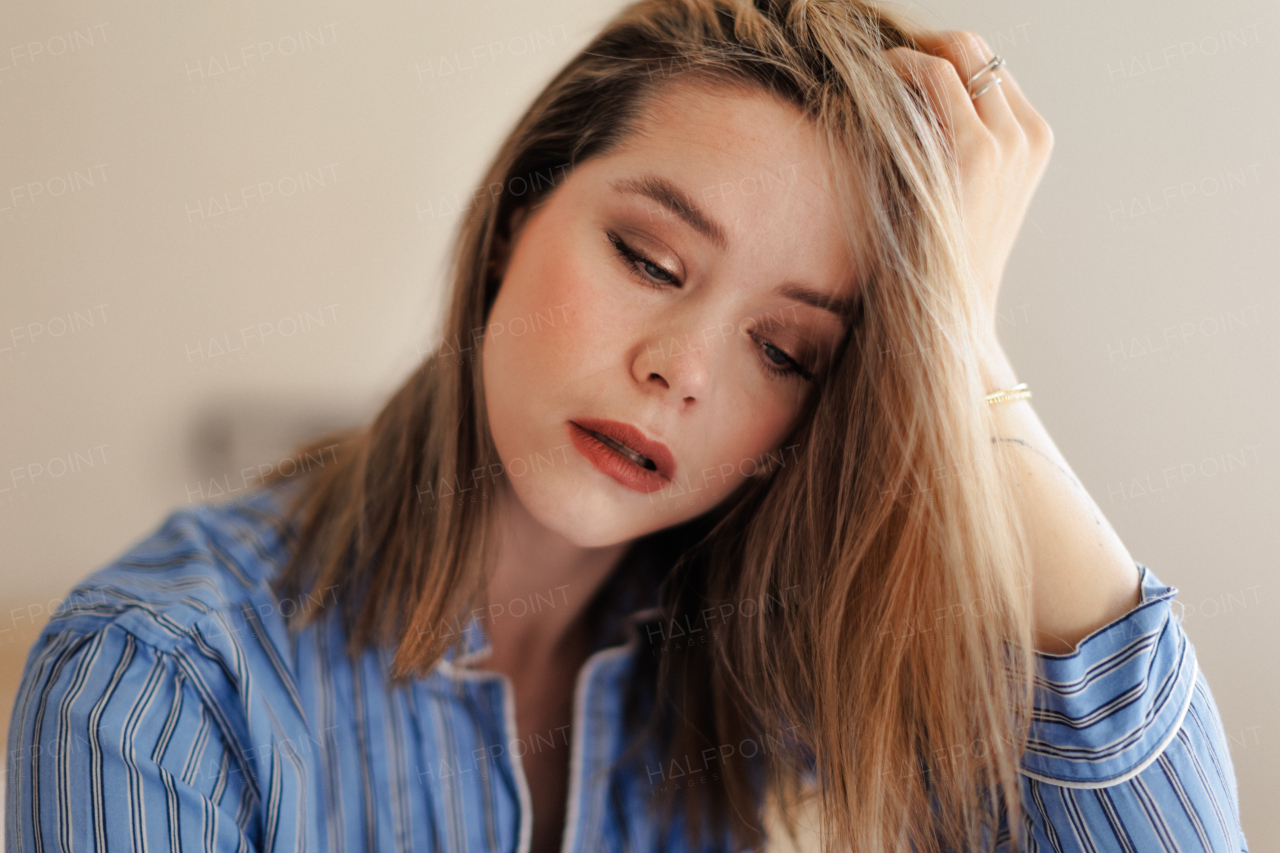 Portrait of young woman in a pajama.