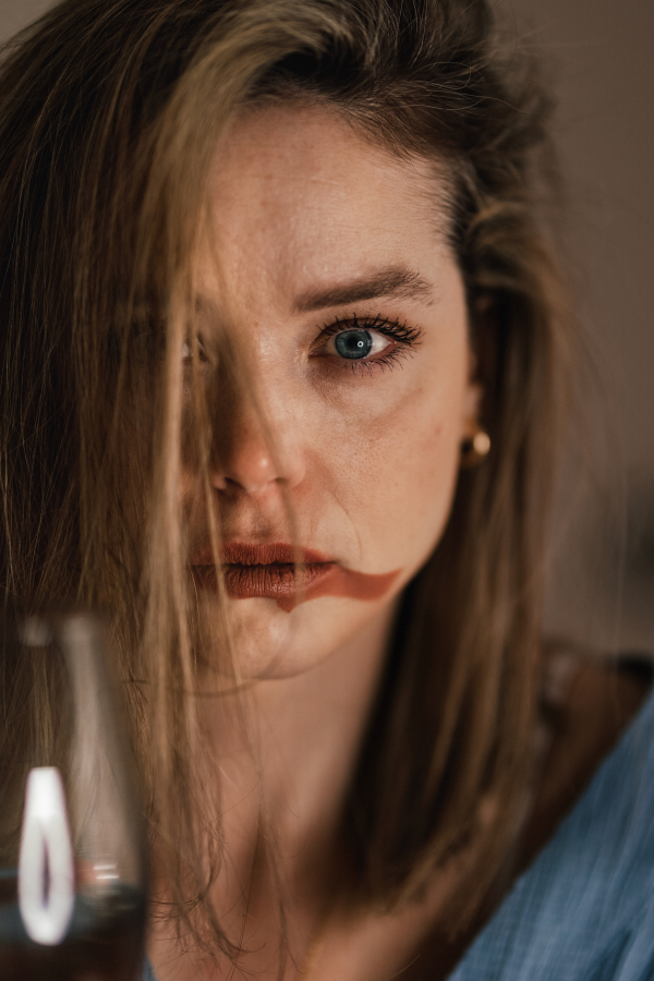 Portrait of crying woman doing the make up.